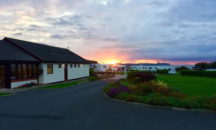 Reception with sunset over the Orme